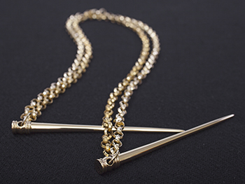 Statinėliniai smeigtukai, sujungti dviguba grandinėle iš Muoriškių, IIa. 